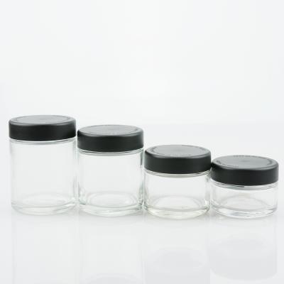 China Cosmetic high quality 1 oz 2 oz 3 oz 4 oz glass jar with child proof cap for packaging for sale