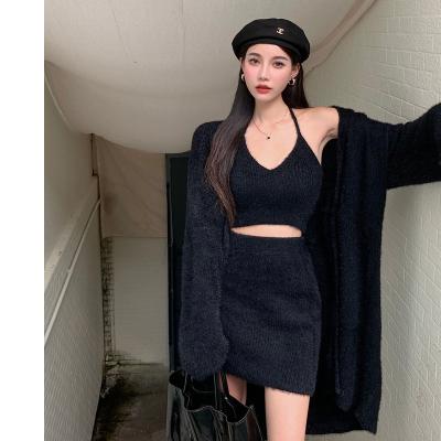 China Breathable High Waist Bag Skirt Suit Camisole Women Knit Cardigan Sweater Mid Length Coat Set Women Clothing 3 Piece Set for sale