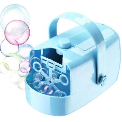 China Plastic Battery Operated Or Plug In Portable Bubble Machine Toy For Kids for sale