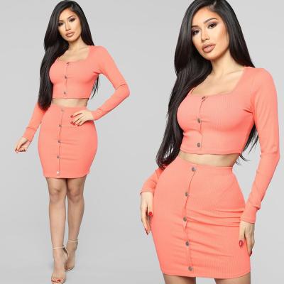 China Anti-Wrinkle Ready To Ship Women's Outfits Two Piece Long Sleeve Navel Top Wrap Casual Bodycon Short Hip Set Skirt For Women for sale