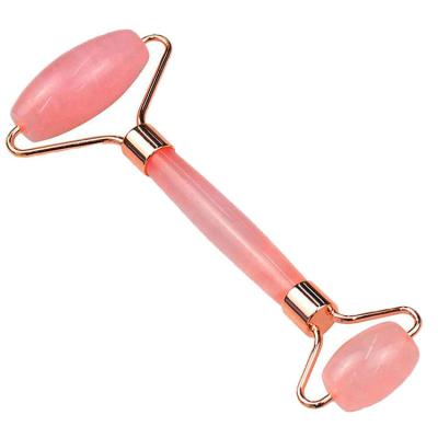 China Hot Pink Rose Quartz Jade Roller 100% Natural Facial Massager Tool for Face and Body for sale