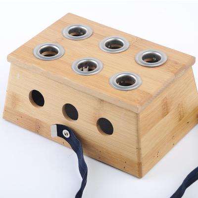 China Warm Meridians and Activate Collaterals 6 Holes Moxa Roll Holder for Acupoint Massage for sale