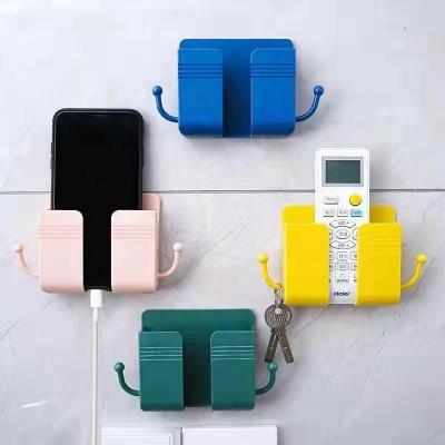 China New CLASSIC Style Wall Mount Phone Holder Candy Color Stand Mobile Phone Storage Holder for sale