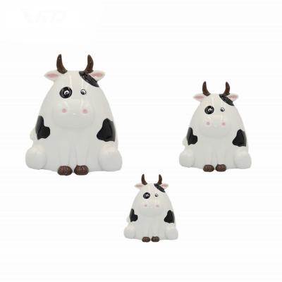 China 2022 new ceramic child likest item china money saving box for ceramic cow for sale