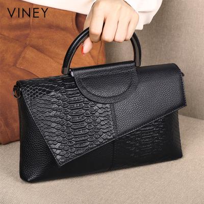 China Waterproof 2022 wholesale luxury new style luxury fine material black sling genuine leather clutch ladies handbags large capacity for sale