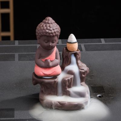 China Small Buddha Burner Ceramic Waterfall Incense Buddha Mini Ceramic Incense Burner Coil Chinese Brass Portable Censer Yoga Incense Monk for sale