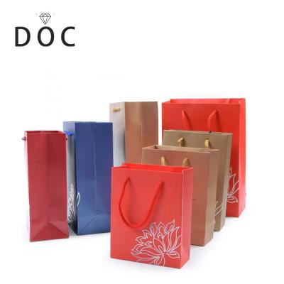 China OEM+ODM+Wholesale Luxury Jewelry Packaging Bags With Rope Handle Custom Jewelry Gift Bags Shopping Bags for sale