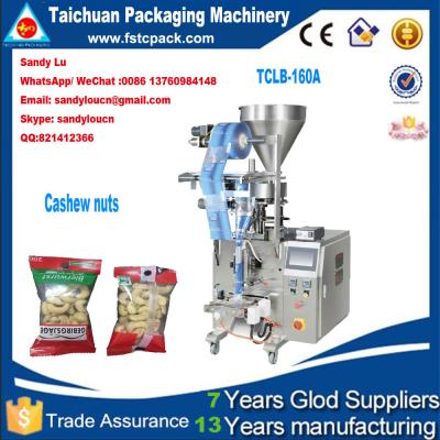 China Automatic cashew nuts Vertical Packaging Machine with nitrogen gas filling&round hole for sale