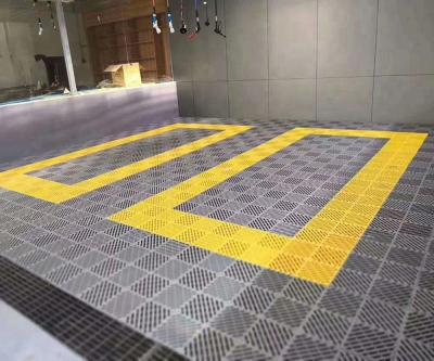 China Movable Industrial Car Wash Floor PP Garage Interlocking Floor Tiles Waterproof Wear Resistant Anti-Slip for sale