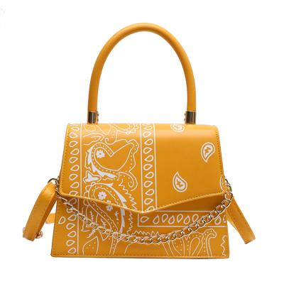 China 2021 New PU Fashion Wholesale Ladies Colorful Printed Handbags Women Flower Messenger Shoulder Bag for sale