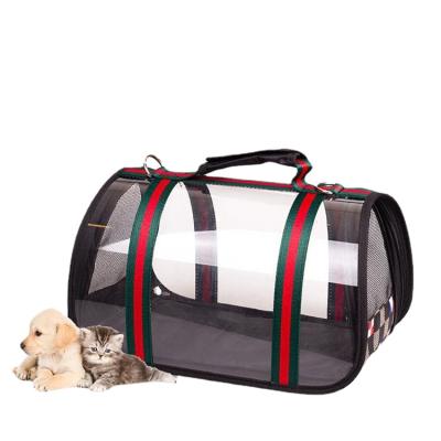 China Luxury Foldable Cat Bag Pet Carrier Breathable Portable Transparent Bag Travel Dog Carrier for sale