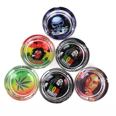 China Viable Round Customized Shape Painting Logo Made Lead Marley Glass Fashionable Creative Smoke Accessories Cigar Smoking Ashtray for sale