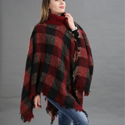 China Cheap Anti-pilling Turn-Down Collar Winter Thick Cable Knitted Women Warm Tassel Poncho for sale