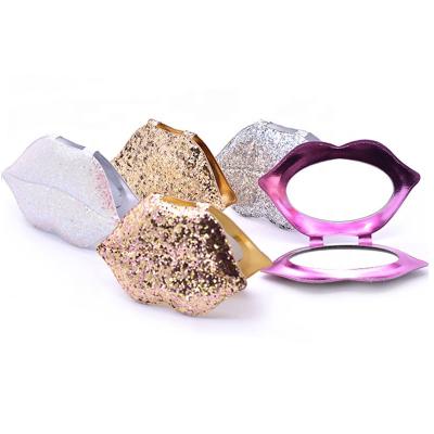 China Custom Logo Glitter Lip Shape Pocket Mirror Glitter Compact Makeup Enlarging Mirror for sale