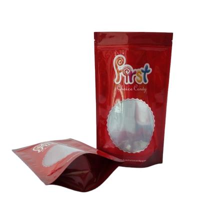 China Candy red color stand up pouch with round window doypack foil pouch bag for sale