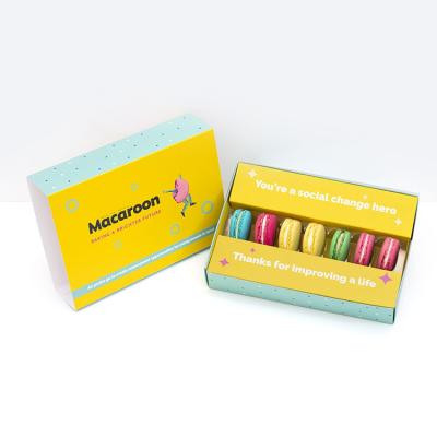 China Disposable low moq coated paper box 12 macaron packaging yellow gift box customized paper macaron box with insert for sale