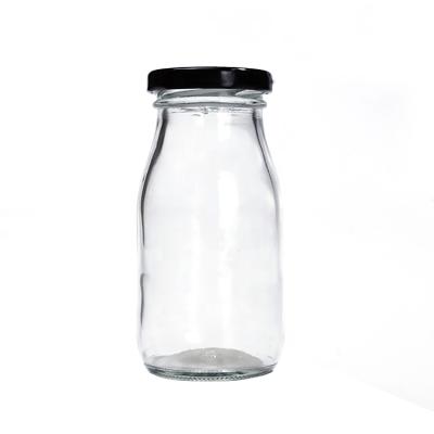 China Wholesale 200ml 250ml 500ml 1000ml eco-friendly glass milk bottle with metal lid for sale