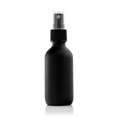 China Eco-Friendly Cosmetic Bottles Packaging Series Round Shoulder Matte Black Glass Bottle And Cosmetic Jar Spray Bottle for sale