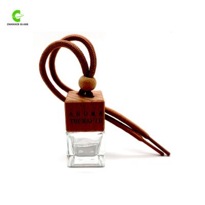 China Personal Care 8ml Square Car Perfume Bottle Empty Car Perfume Bottle With Wooden Lids for sale