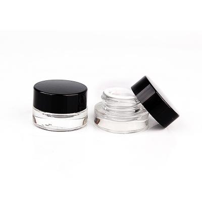 China Eco - Friendly 3g 5g Mini Cosmetic Eye Cream Glass Concentrate Jars With Black Lids for sale