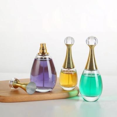 China Eco - Friendly 30ml 50ml 100ml Empty Fancy Round Clear Fragance Bottle Perfume for sale