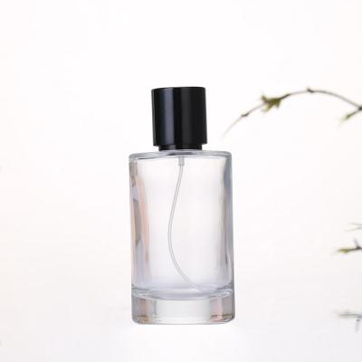 China Eco - Friendly Customized Perfume Bottle Container Round Shaped 50ml 100ml Perfume Glass Bottle for sale