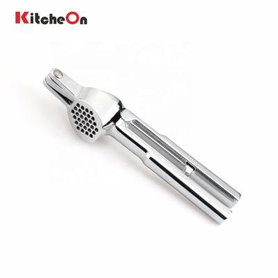 China Viable Hot Selling Kitchen Tool Zinc Alloy Garlic Press With Self-cleaning Remover for sale