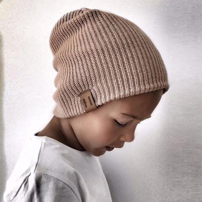 China 2021 New COMMON Label Kids Leather Winter Customize Kids Baby Beanie Hat for sale