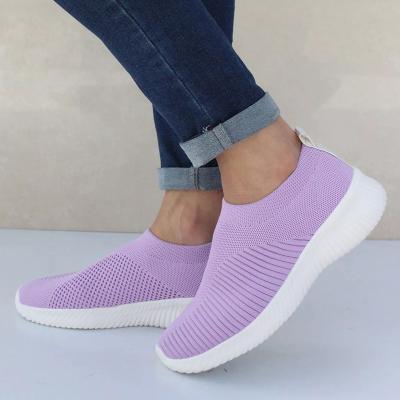 China Hot Selling CUSHIONING Colored Sock Knitting Sneakers Slip On Shoes Light Weight Flat Walking Shoes For Women for sale