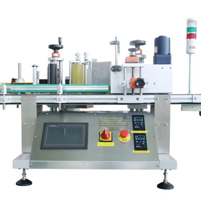 China Desktop Beverage Water Round Bottle Labeling Machine Automatic Flat Round Bottle Labeling Machine for sale