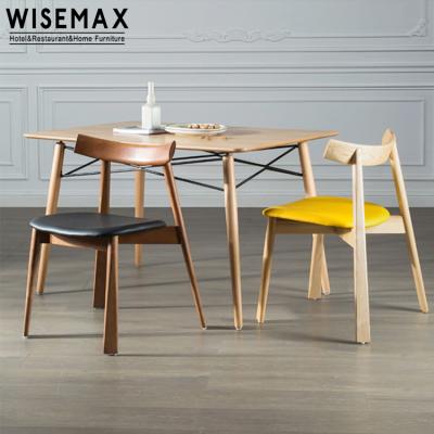 China WISEMAX FURNITURE Nordic Dining Room Furniture Minimalist Design Curved Backrest Fabric Wooden Dining Chair for sale