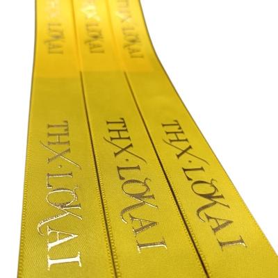 China Cheap Customized Viable Ribbon Gold Custom Silver Foil Printed Ribbons Brand Logo Name Printed Satin Ribbon For Packaging for sale