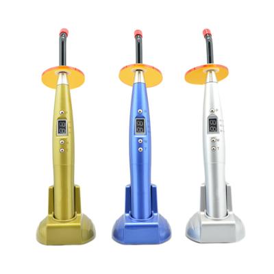 China Rainbow LED Curing Light of Dental Equipment Wireless Plastic Body Led Curing Light for sale