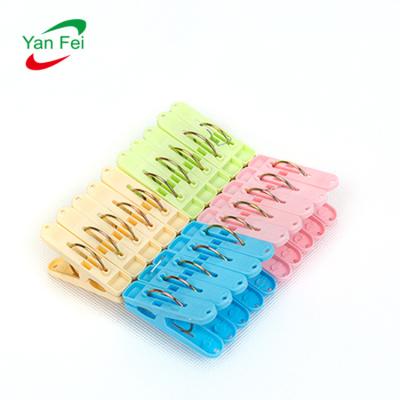 China Fashionable China Manufacturer Colorful Soft Grip Strong Round Plastic Clothespin Clothespins For Clothes for sale