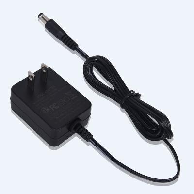 China Home Appliance AC DC Adapter Wall Plug 12v 1A 2A 5V Power Adapters for sale