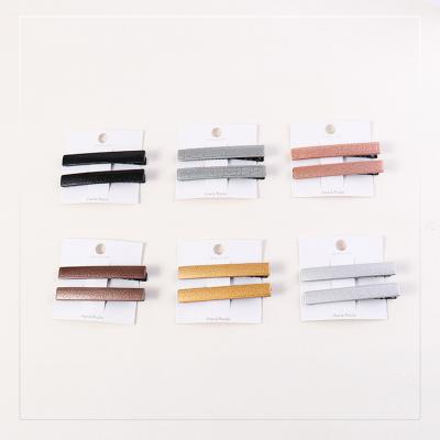 China Fashion Trendy Faux PU Leather Hair Clips, Whole Sale Plastic Hair Clips For Girls. New Insti PU Ponytail Hair Pins for sale