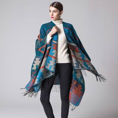 China Hot Sell Acrylic Multi Tribal Jacquard Poncho Cape Stylish Winter Shawl Wrap For Women Cover Up Scarf for sale