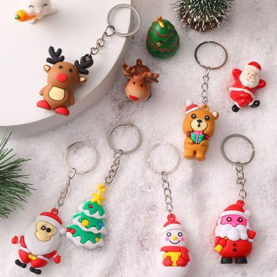 China Hot Selling Cute Cartoon Toy Amazon Merry Christmas Busy Person Toys Santa Keychain Plastic Rubber Set for sale