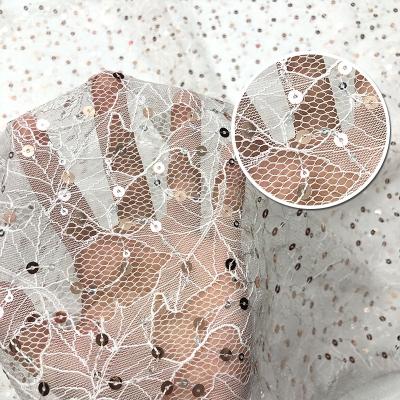 China 2 Yards Breathable Tulle Fancy Lace Fabric Luxury Embroidery Black Pink White Net Bridal Sequins Beads Mesh Fabric for sale