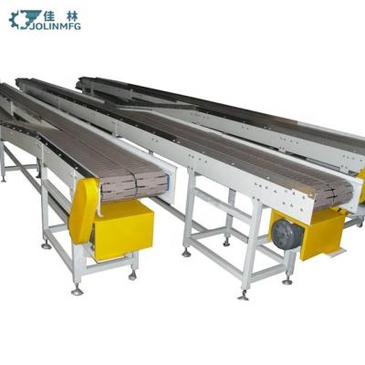 China Heat Resistant Chain Conveyor Stainless Steel Belt Conveyor Side Load Case Top Packer for sale