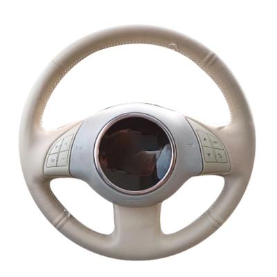 China Hand-stitched Four Seasons General Beige Leatherette No-Slip Car Steering Wheel Cover for sale