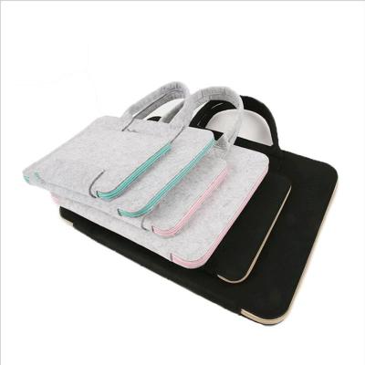 China Fashion Factory Selling Custom Colored Logo Dustproof Felt Notebook Bag Large Capacity Multifunctional Boys Girls Students Computer Bag for sale