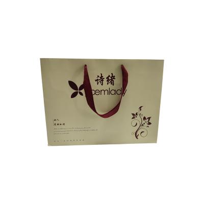 China Recycled Materials Customized Paper Shopping Bag Wholesaler Gift Paper Bag Cheap Price for sale