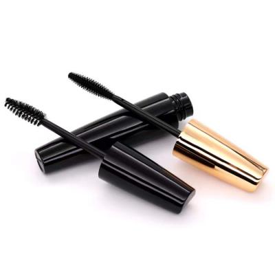 China Unique Design Matte Black And Shiny Gold Mascara Tube Bottle Cosmetic Packaging With Magic Wands Brushes for sale