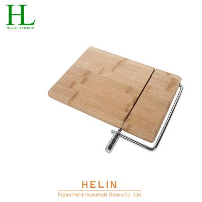 China Sustainable Bamboo Cheese Slicer , Cheese Cutting Board With Slicer Wire for sale