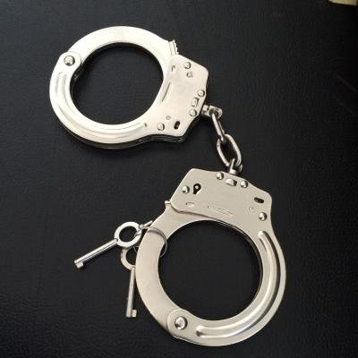 China Strong nij standard carbon steel handcuffs with double low teeth for sale