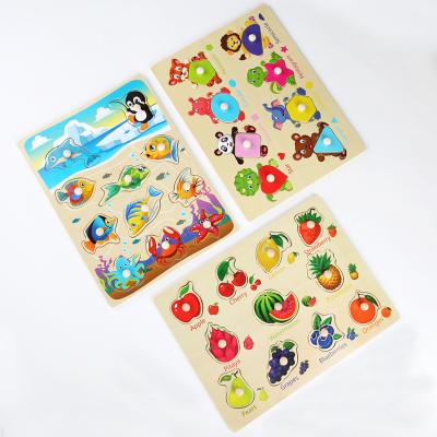 China Eco-friendly 16 Models Children's Educational Wooden Jigsaw Hand Grasping Jigsaw Board Cartoon Fruit Wooden Jigsaw Animal Toy for sale