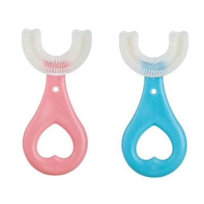 China Wholesale 360 ​​Cartoon Baby Silicone Toothbrush U Shape Manual Toothbrush For Kids Brushing Teeth Soft Teether for sale