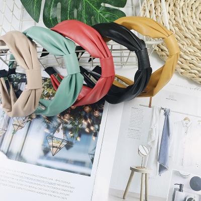 China Fashion New Girls Accessories Candy Color Leather Headbands For Women Fashion Bow Hair Band for sale