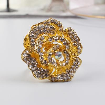 China Stocked Metal Gold Roses Flower Napkin Ring For Party Table Decoration for sale